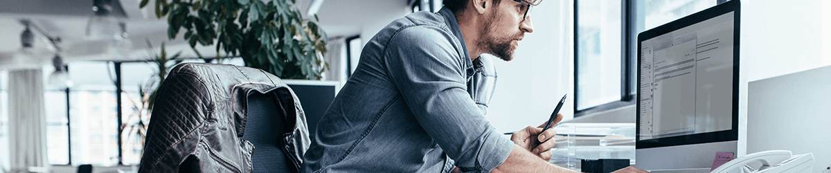 A man working alone in an office